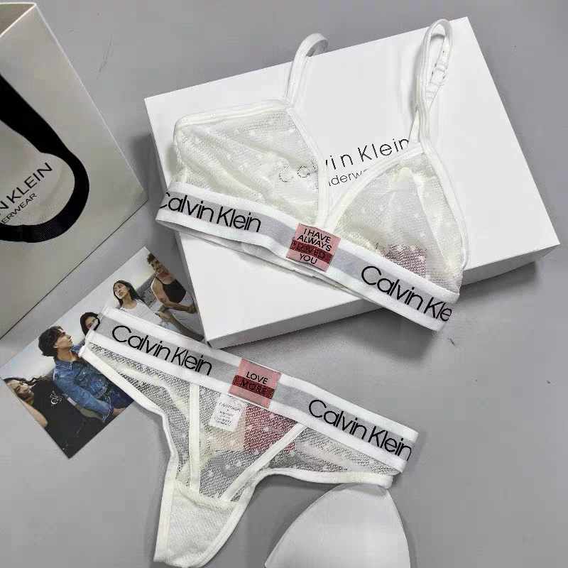 Женский комплект Calvin Klein в сеточку белый: топ и стринги CA21