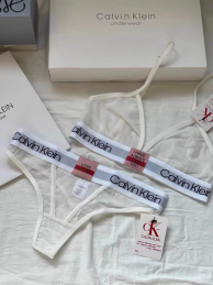 Женский комплект Calvin Klein в сеточку белый: топ и стринги CA21