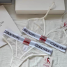 Женский комплект Calvin Klein в сеточку белый: топ и стринги CA21