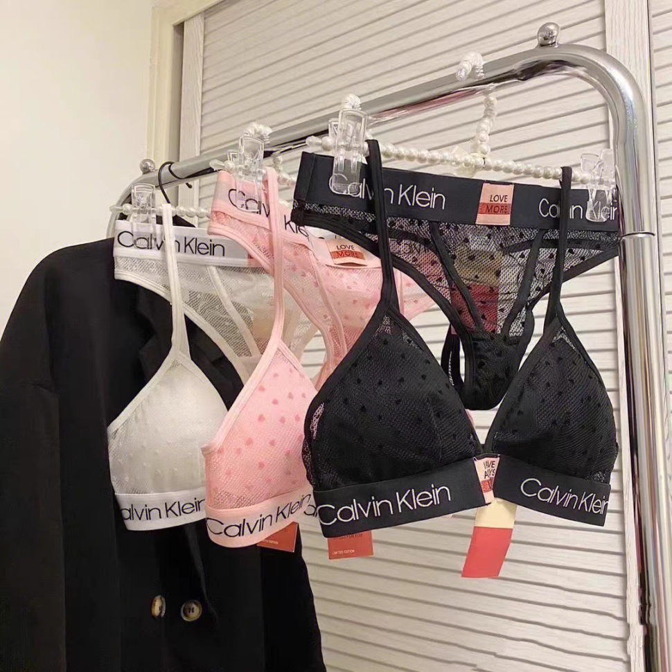 Женский комплект Calvin Klein в сеточку белый: топ и стринги CA21