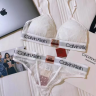 Женский комплект Calvin Klein в сеточку белый: топ и стринги CA21