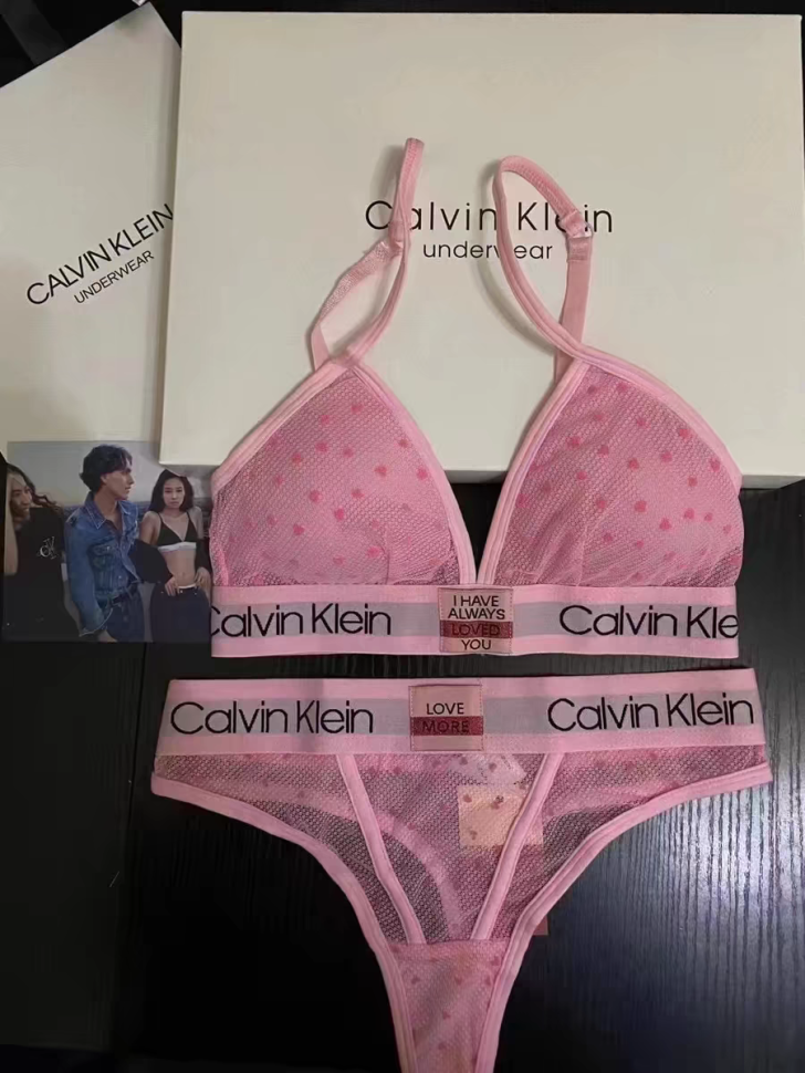 Женский комплект Calvin Klein в сеточку розовый: топ и стринги CA22