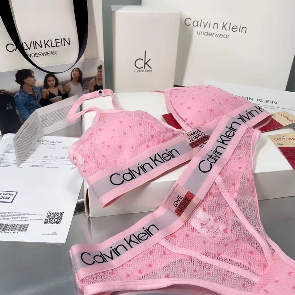 Женский комплект Calvin Klein в сеточку розовый: топ и стринги CA22