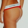 Женские стринги Calvin Klein красные с белой резинкой B049